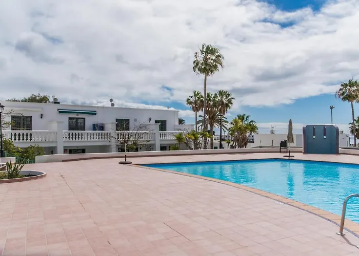 Pet friendly Casa Anemona With Terrace Shared Pool Sea Views And Free Wifi Apartment Puerto del Carmen 